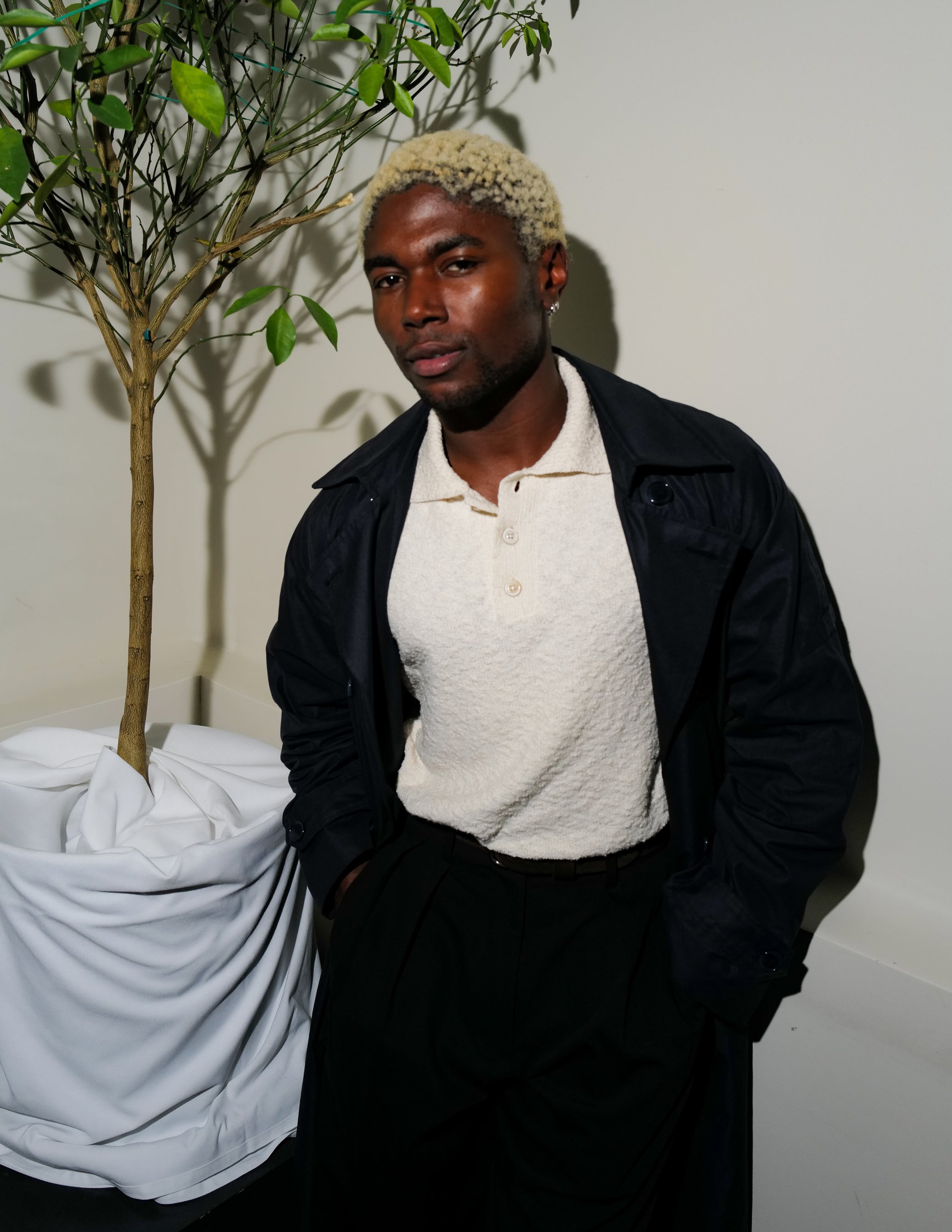 Frankie Shop customer wearing the Tansy trousers and Anderson Trench coat