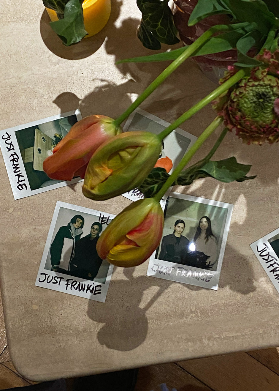 A pile of Polaroids of guests who attending the event at The Frankie Shop