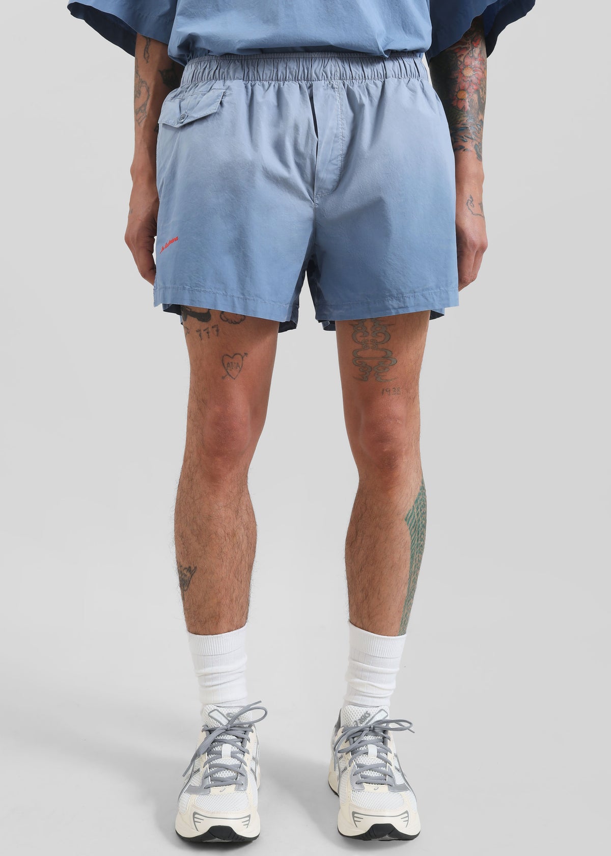 JW Anderson Logo Print Shorts - Light Blue - 1