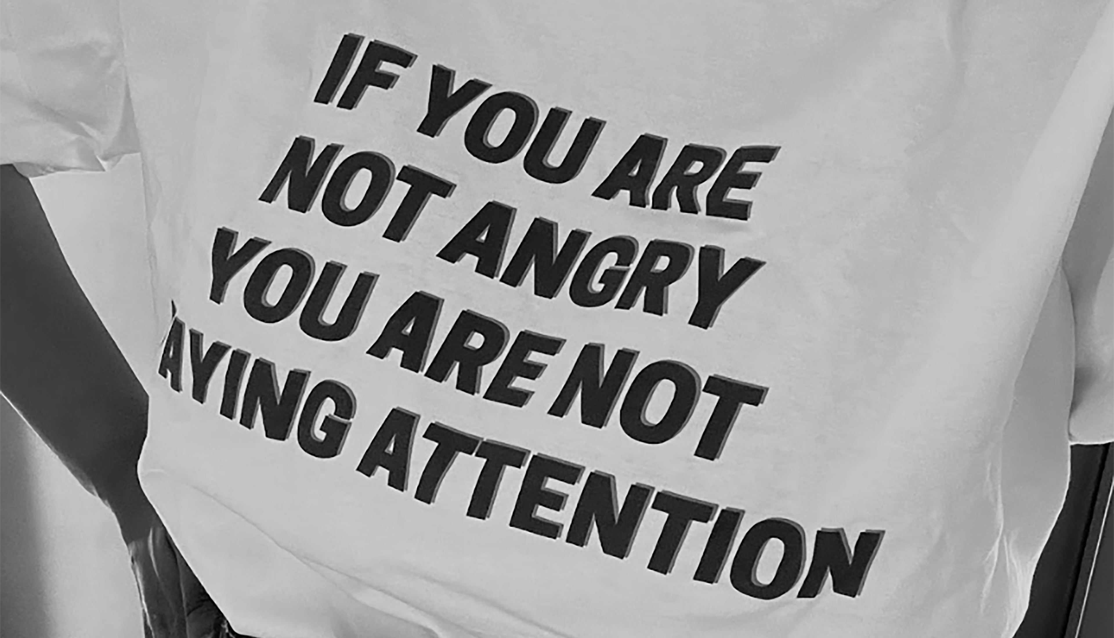 Close up image of TFS t-sheet "If your not angry you are not paying attention".