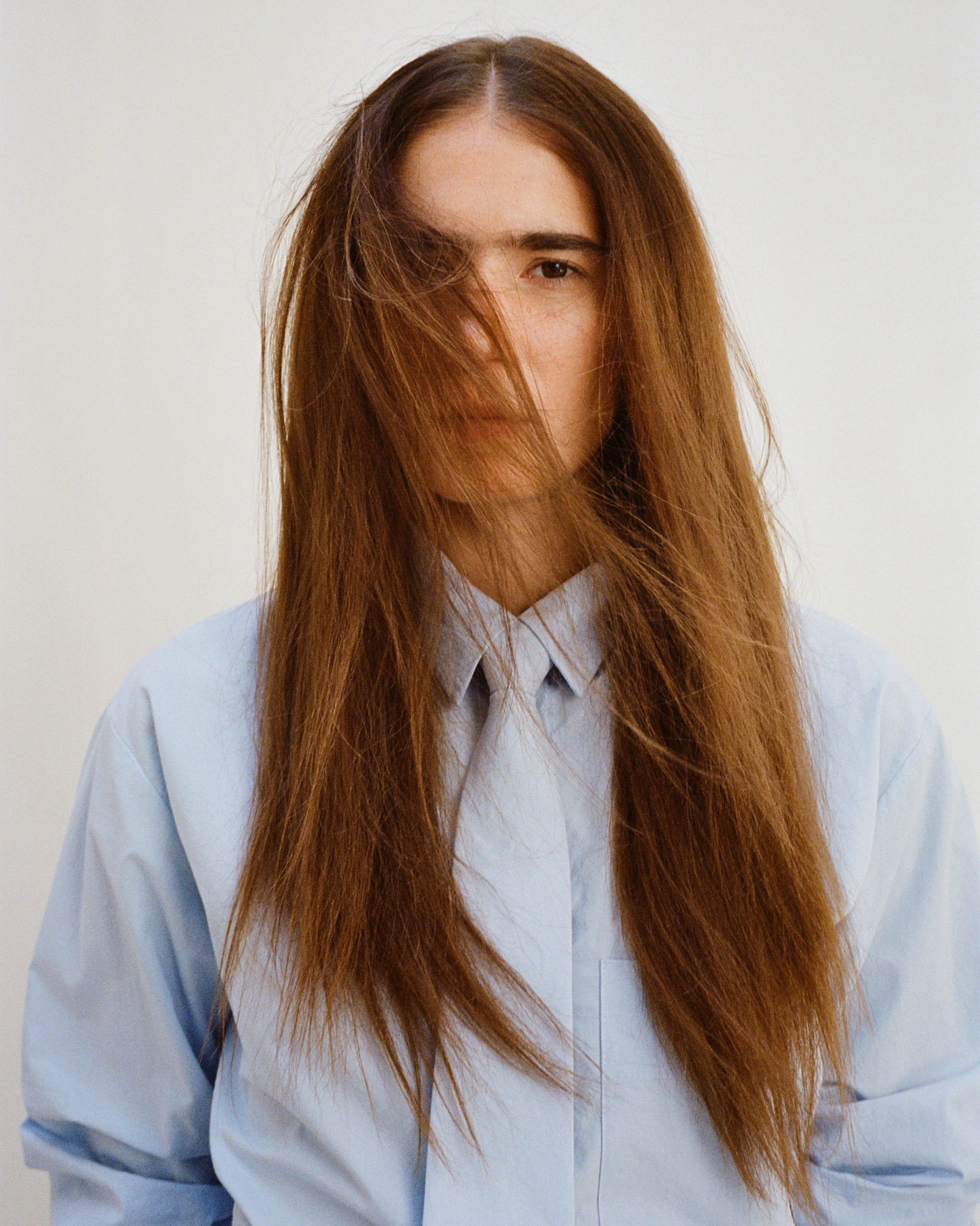 Laszlo Badet in the Frankie Shop Annie neck tie top. 
