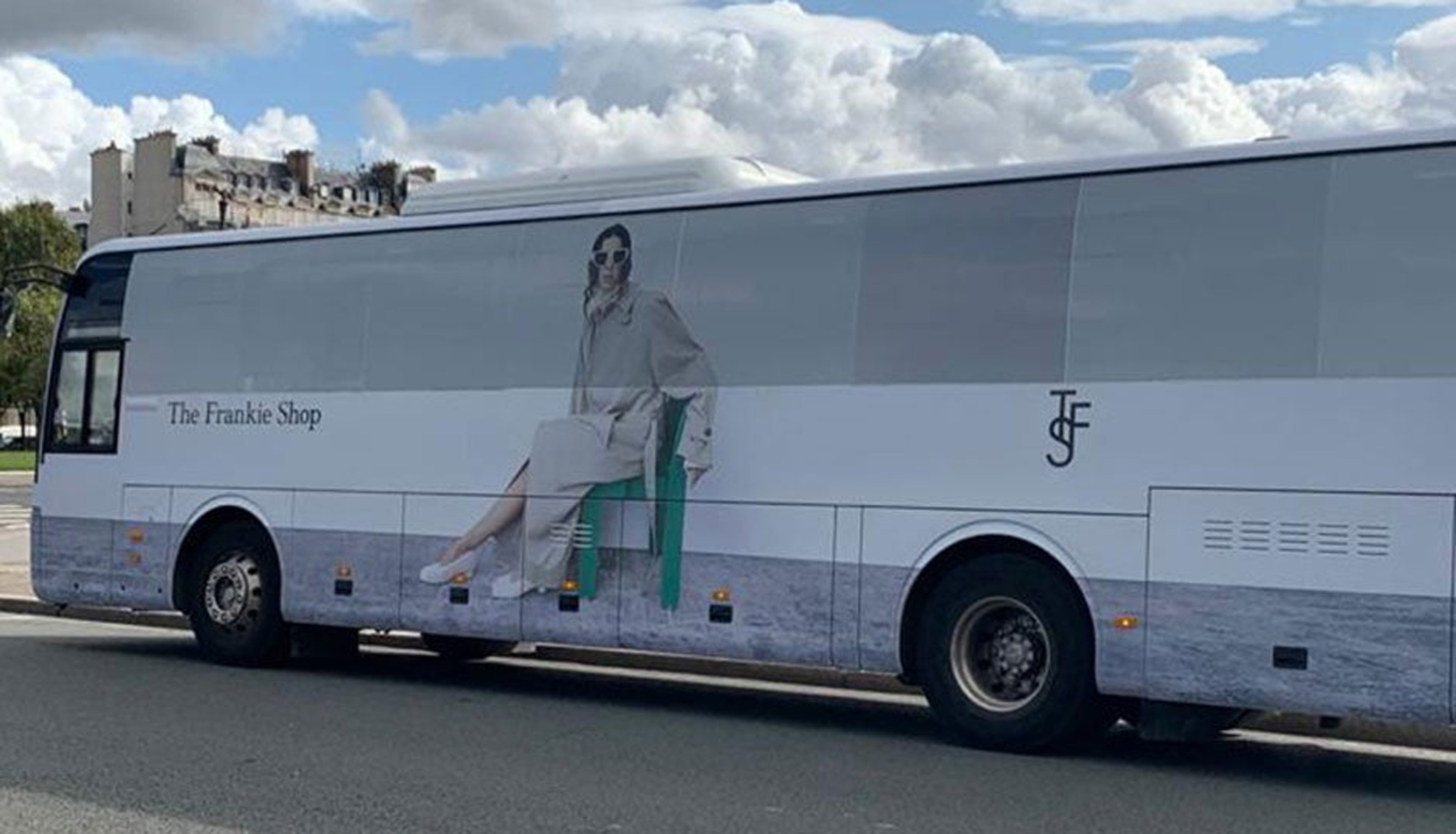 Image of a bus with the Frankie Shop FW21 campaign printed on it. 